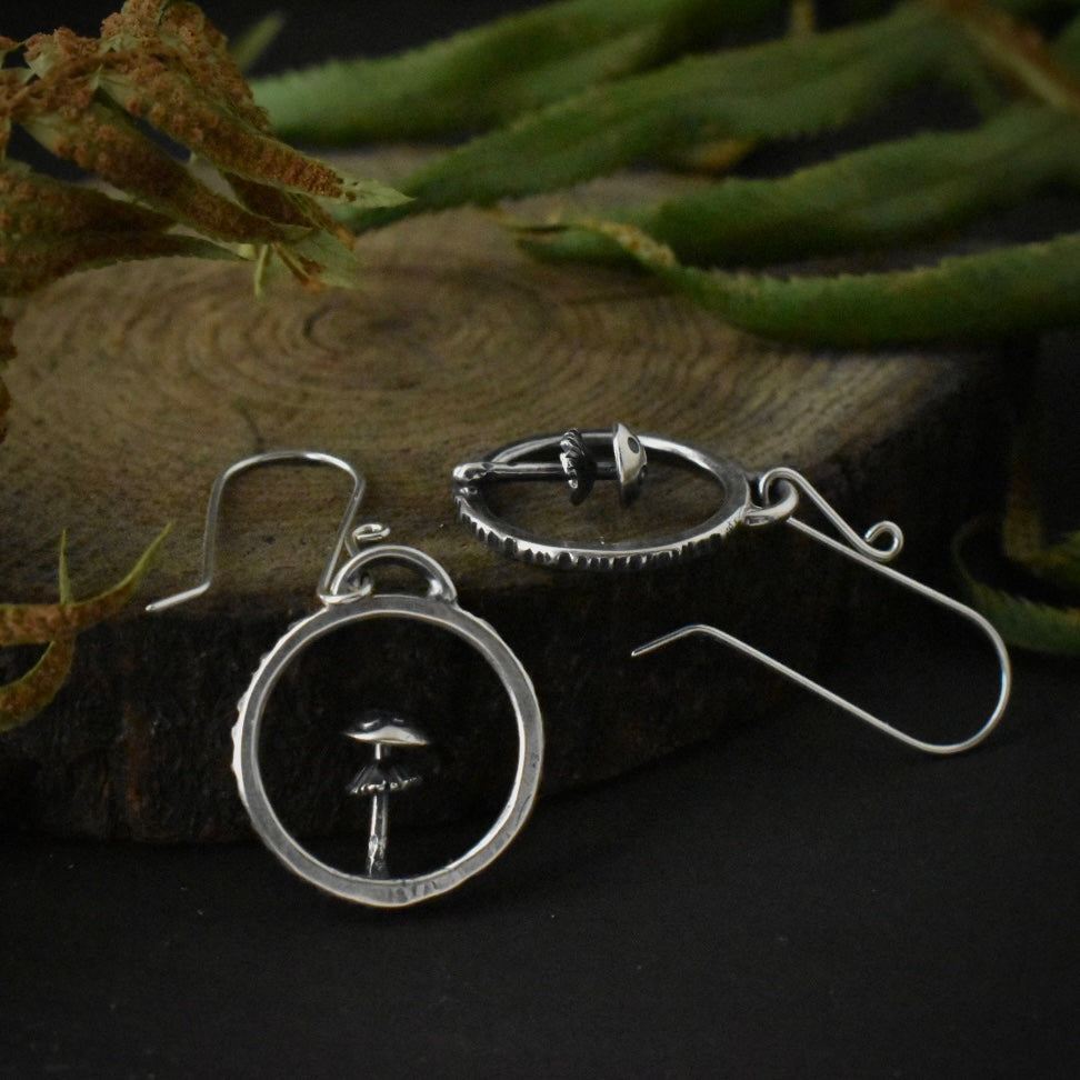 Another look at the Amanita Hoop Earrings, showing their sterling silver ear wires.