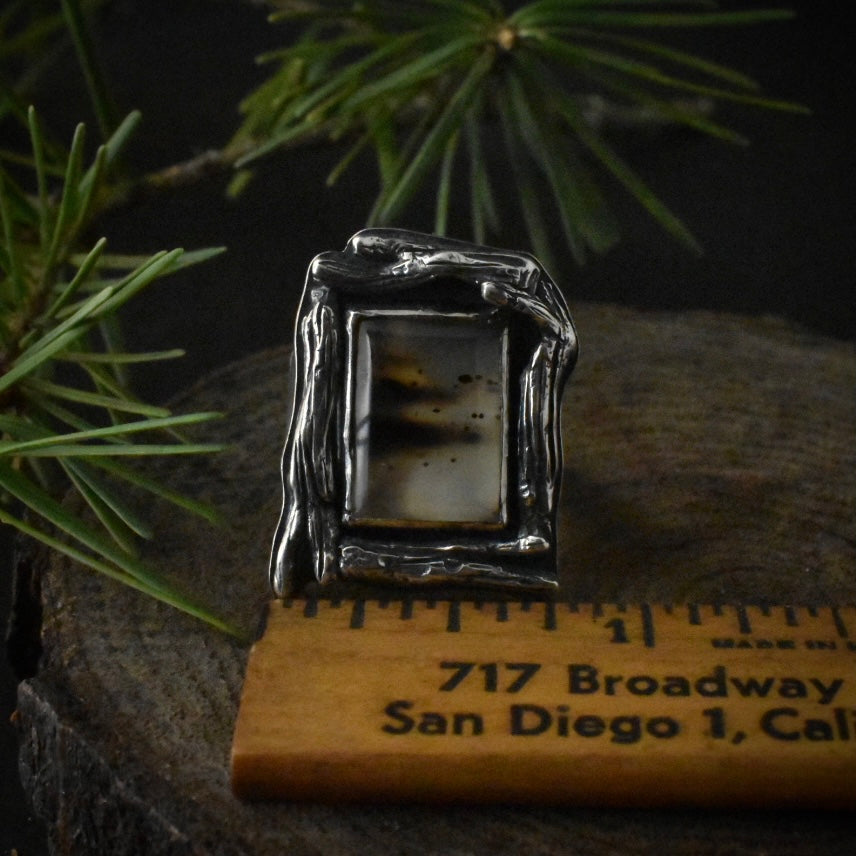 The Montana Agate Driftwood Ring with a ruler for scale, measuring around 3/4 inches wide.