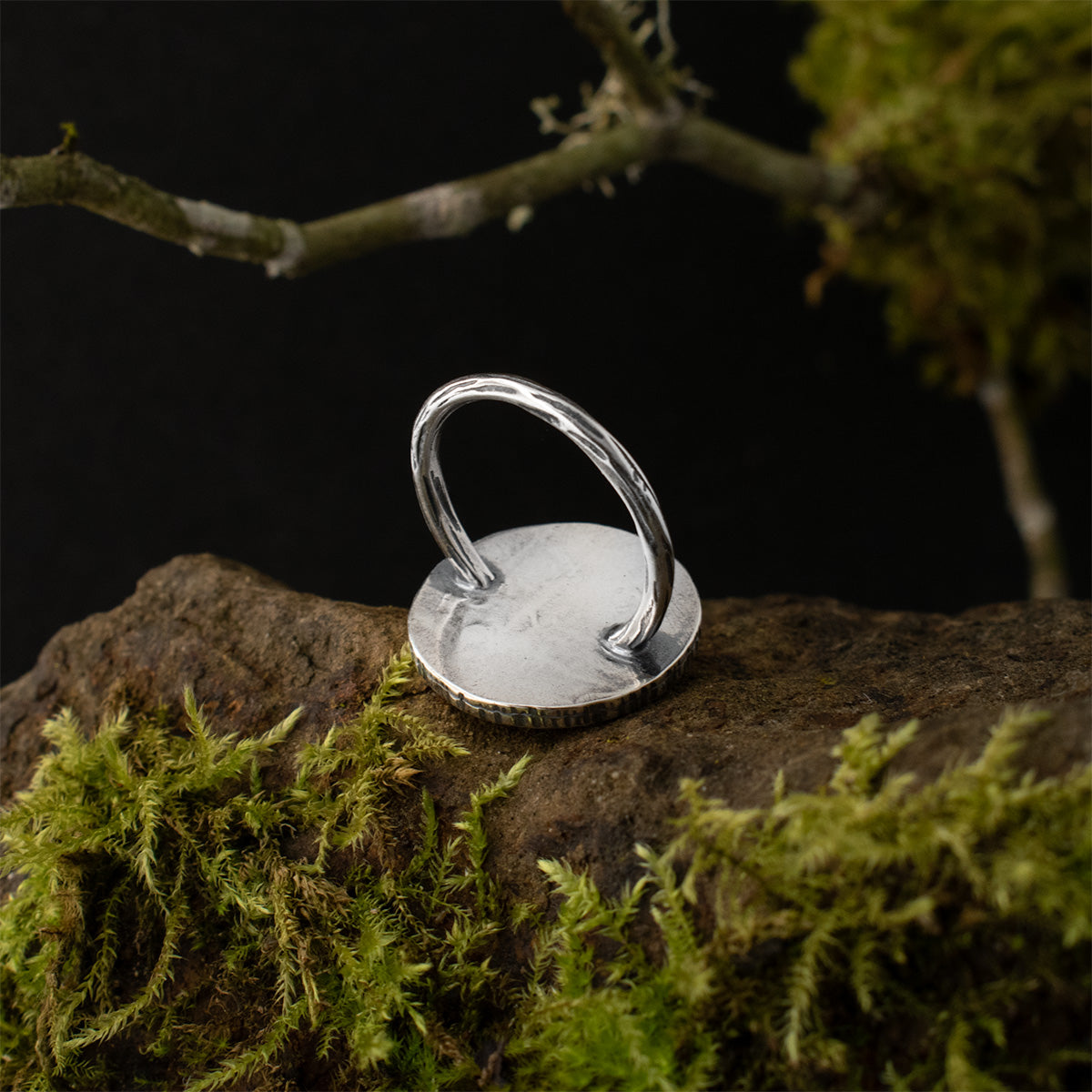 The underside of the Mycena Duo Shadow Box Ring, showing its carefully textured sterling silver band.