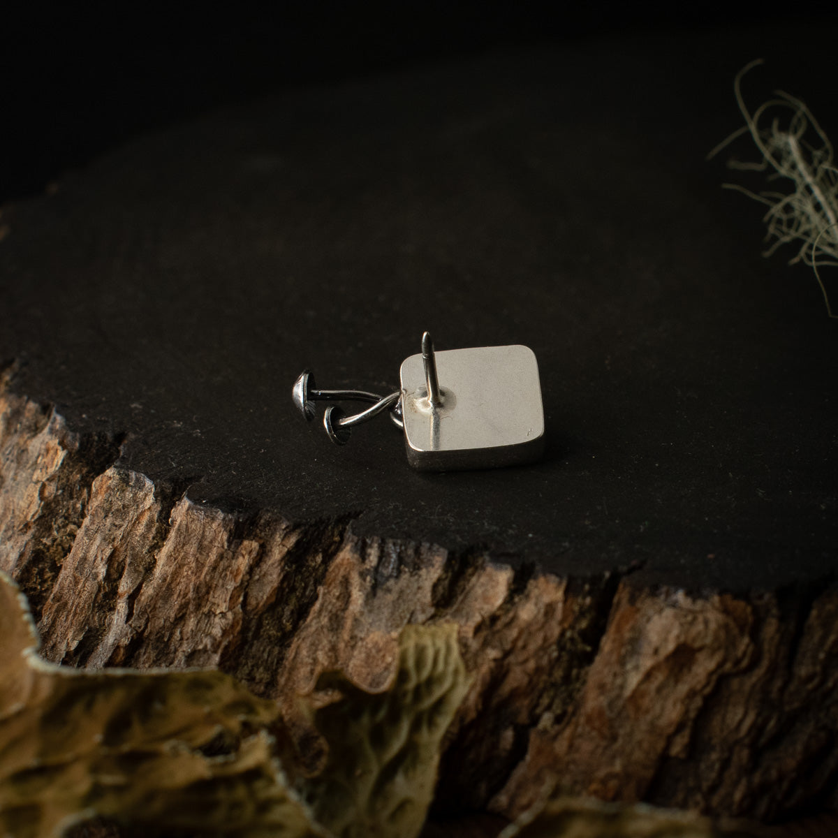 The back of the Real Lichen Mycena Duo Lapel Pin.