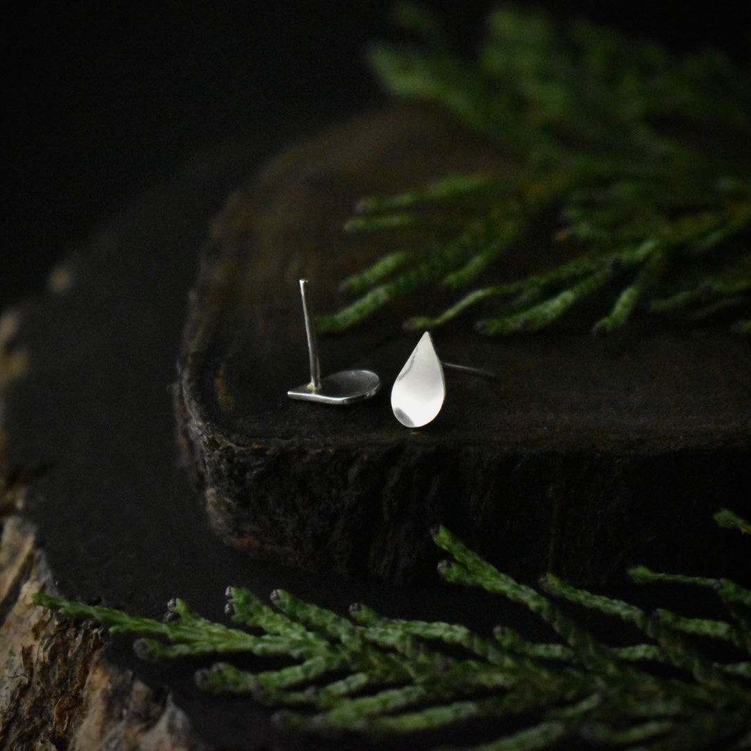 Another look at the Raindrop Stud Earrings, showing their sterling silver ear wires.