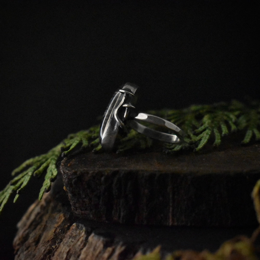 The right side of the Rutilated Quartz Fungal Ring, showing two intertwining sterling silver mushrooms. 